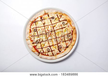 Italian Delicious Pizza With Olive, Cheese And Ham.