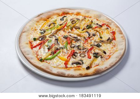 Fresh Pizza With Pepper, Cheese And Mushrooms On White Plate