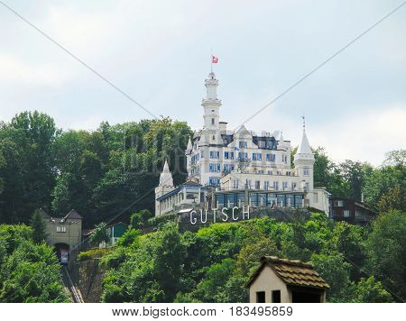 Lucerne Switzerland - July 11 2007: Ancient castle and the hotel of 