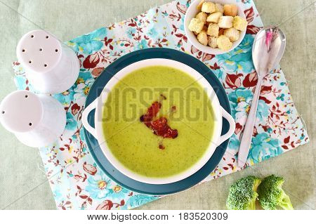 A bowl of a creamy broccoli soup with crunchy bacon. Healthy food. Healthy eating concept