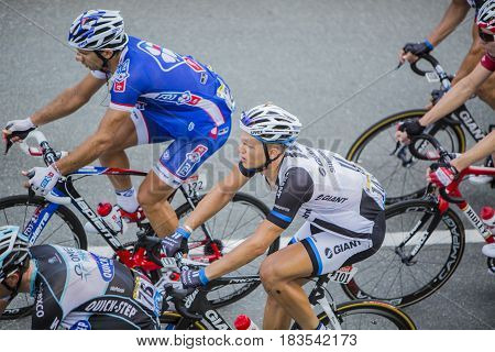 Col de PeyresourdeFrance- July 23 2014: The German cyclist Marcel Kittel of Giant-Shimano Team riding in the peloton (gruppetto) on the road to Col de Peyresourde in Pyrenees Mountains during the stage 17 of Le Tour de France on 23 July 2014.