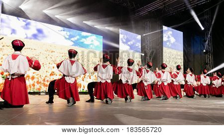 People dance on stage Russian folk dance