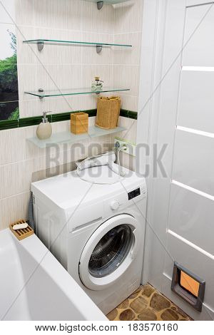 Small modern bathroom interior. Well organized space.