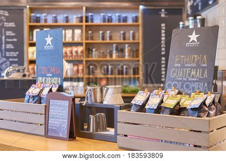 SAINT PETERSBURG, RUSSIA - CIRCA APRIL, 2017: goods on display in Starbucks coffee shop. Starbucks Corporation is an American coffee company and coffeehouse chain.