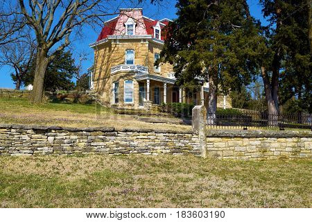 Historic stone mansion built in the 1880s taken at Spring Hill Ranch on the Kansas Prairie