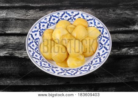 Mini Green Mango Compote Served In Thai Pattern Plate.