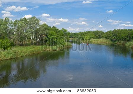 Landscape with small Ukrainian river Samara at summer season.