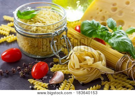 Ingredients For Cooking Italian Pasta - Spaghetti, Fusilli, Fettuccine, Basil, Cherry Tomato, Garlic