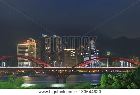 Guandu Bridge night cityscape in Taipei Taiwan