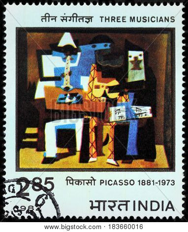LUGA RUSSIA - APRIL 26 2017: A stamp printed by INDIA shows painting Three Musicians by famous Spanish painter Pablo Picasso circa 1982