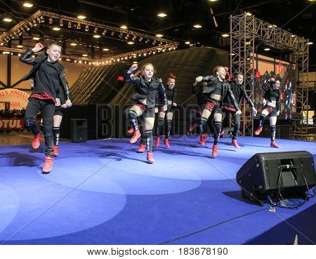 St. Petersburg Russia - 15 April, Active dances on stage,15 April, 2017.
International Motor Show IMIS-2017 in Expoforurum.
Dance show group of teenagers in the style of hip-hop.