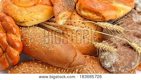 Bread croissants crispy baguettes and other pastries.
