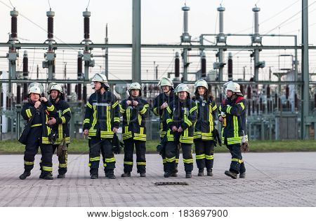 Hamburg, Germany - April 18, 2013: German firefighter team in an exercise