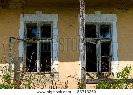 Roztots'ka Pastil' Ukraine - April 25 2017: Windows of an abandoned old house made of adobe on the outskirts of the village in the south-western Ukraine.