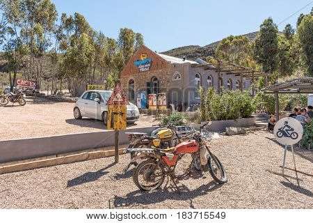 BARRYDALE SOUTH AFRICA - MARCH 25 2017: Old motorcycles and a motel in Barrydale a small town on the scenic Route 62 in the Western Cape Province