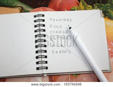 Grocery shopping list checklist note and pencil