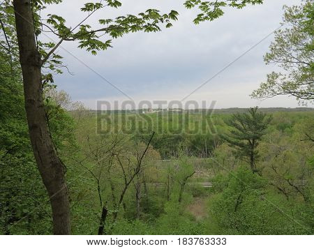 Weather Front in spring passing thru Starved Rock State Park as viewed from bluffs going towards St. Louis Canyon.