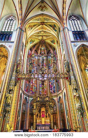 AMSTERDAM, NETHERLANDS - MARCH 30, 2017 Basilica Christ Crucifix Stained Glass De Krijtberg Church Amsterdam Holland Netherlands. Roman Catholic Church built in 1883 maybe the most beautiful church in Amsterdam.