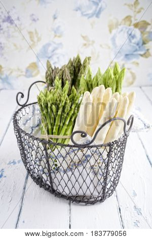 White and Green Asparagus in Basket