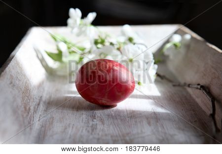 Paskha is a festive dish made in Eastern Orthodox countries. Curd Easter and bunch of flower in close up on the dark background