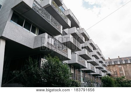 Leuven Belgium - July 30 2016: Modern architecture apartment building. Low angle view.