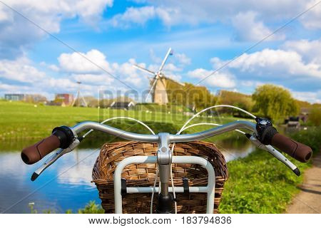 Bicycle and windmill. Symbols of the Netherlands. Tourism bicycle tour travel concept.