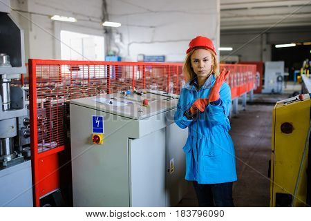 Beautiful Woman In Red Safety Helmet Work As Industrial Worker