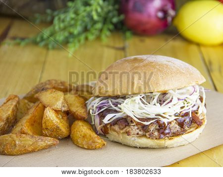  
Pulled pork with BBQ sauce and salad of sweet and sour cabbage