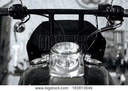 A little checkup. Lovely powerful fast bike stationed in a garage and being maintained in cool place by crafted mechanic