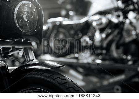 Light the way. Nice speedy powerful vehicle standing in crafty mechanics workshop and shining with nice details