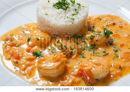 Souse Shrimp With Greens And Rice On A White Background