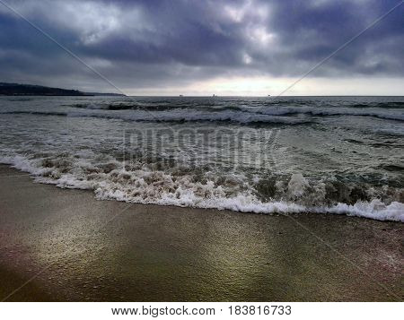 A picture of the beach at sunrise.