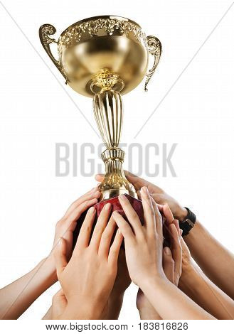 Hands holding a champion golden trophy on white background