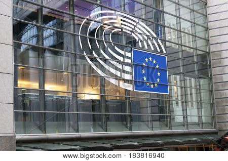 BRUSSELS, BELGIUM. January 25, 2017. The sign of the European Union on the EU Parliament main building glass window.