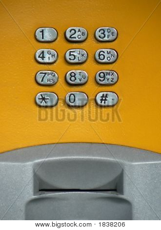 Offentlige telefon gule tastatur