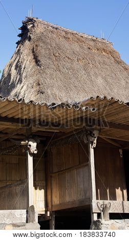 Cow skull detail of hut in Bena a traditional village with grass huts of the Ngada people in Flores near Bajawa Indonesia.
