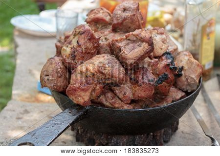 Grilling shashlik on barbecue grill. Selective focus
