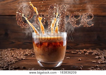 Coffee Lettering, Levitating Text From Coffee Beans With Steam And Splashes From A Cup