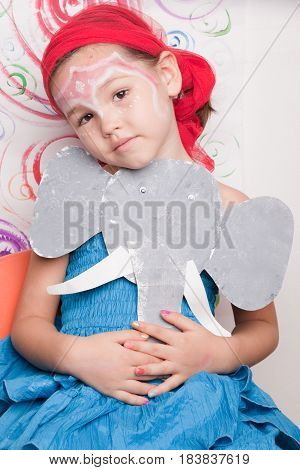 Portrait Of A Cute Child With Elephant