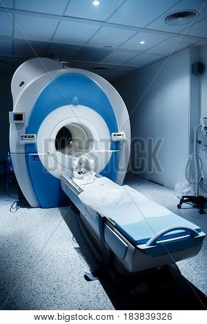 Radiologist in the room, magnetic resonance therapy in the hospital. Concept diagnosis cancer disease.