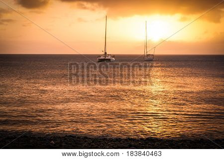 Travels on the Caribbean Sea at Sunset in Dominica