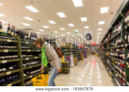 Blurred abstract background of shelf in supermarket interior