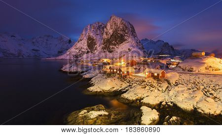 Snowy Hamnoy village in the Lofoten islands at night