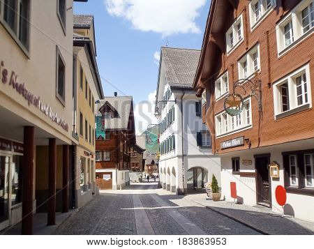 Street Crossing The Village Of Andermatt.