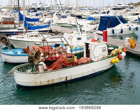 Fisherman System Networks On The Small Boat Moored In The Harbor