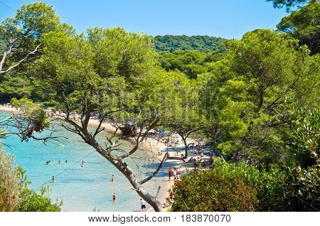 Beach sea and yachts on the coast of porquerolles in france