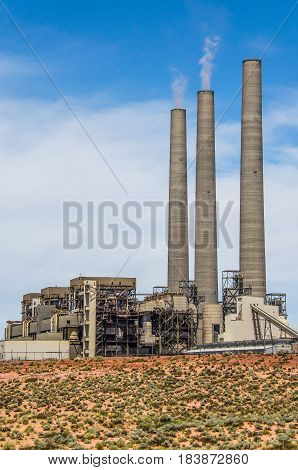 Page USA - August 6 2015: Navajo Generating Station a coal-fired steam plant near Page Arizona. This power plant is one of the biggest pollution emitter in the United States.