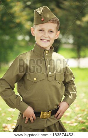 Russian boy in military uniform of the Soviet Army of the Second World War