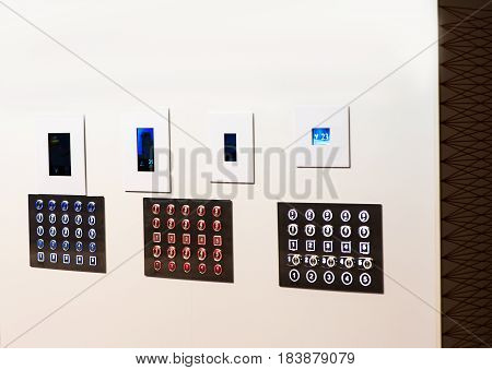 Elevator many buttons 3 multicolor panels. On white background