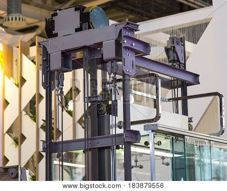 Elevator Installation, Lift Technician Installing a Modern Elevator.